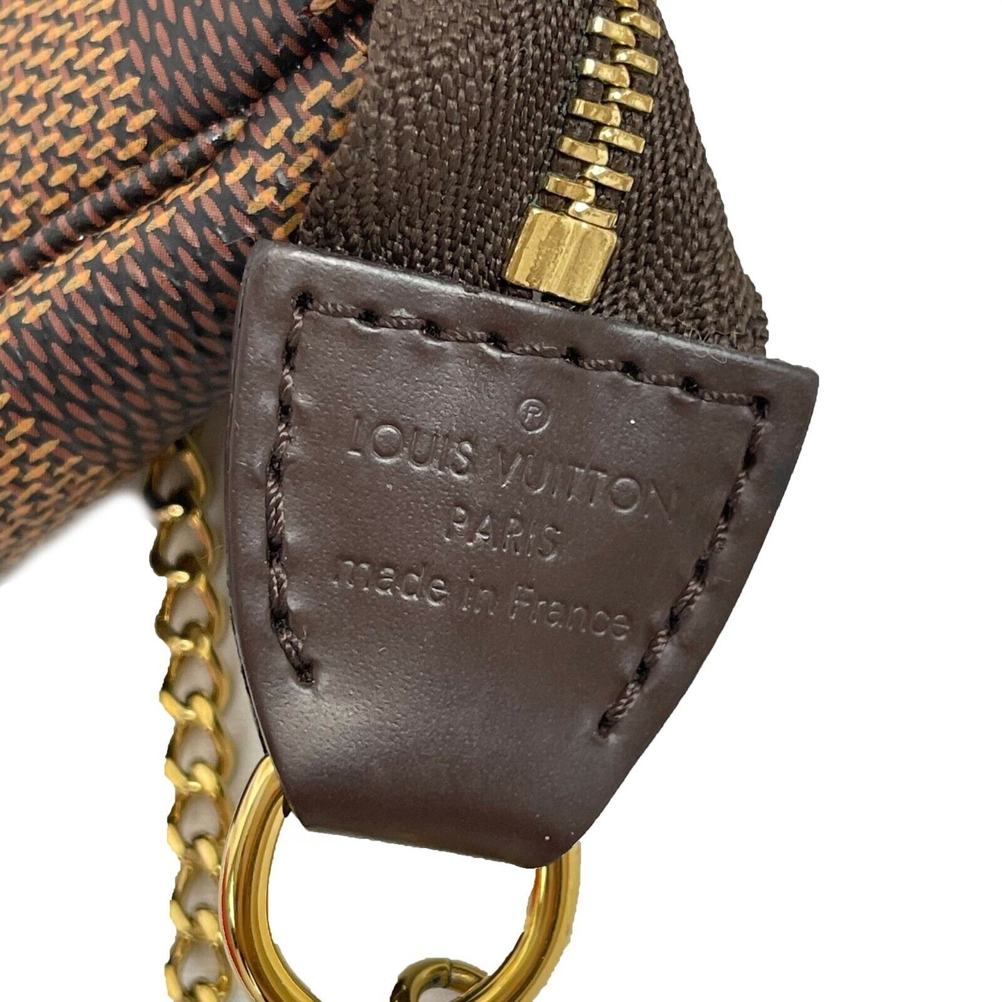 Louis Vuitton Mini Pochette Damier Ebene Brown Accessories